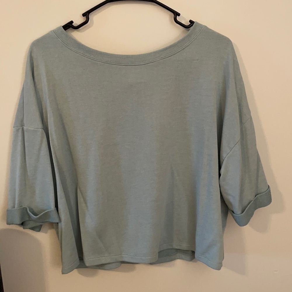 Blue T-shirt.